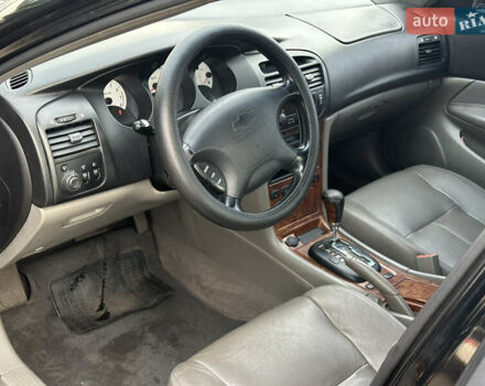 Черный Шевроле Эванда, объемом двигателя 2.5 л и пробегом 165 тыс. км за 3499 $, фото 11 на Automoto.ua