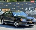 Чорний Шевроле Еванда, об'ємом двигуна 2 л та пробігом 125 тис. км за 5800 $, фото 1 на Automoto.ua
