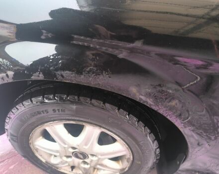 Черный Шевроле Эванда, объемом двигателя 2 л и пробегом 180 тыс. км за 3000 $, фото 6 на Automoto.ua