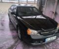 Чорний Шевроле Еванда, об'ємом двигуна 2 л та пробігом 175 тис. км за 4000 $, фото 1 на Automoto.ua