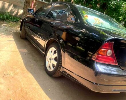 Черный Шевроле Эванда, объемом двигателя 2.5 л и пробегом 303 тыс. км за 3400 $, фото 7 на Automoto.ua