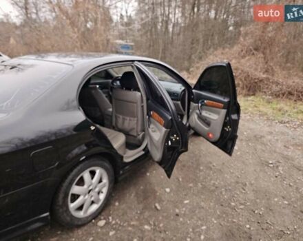 Черный Шевроле Эванда, объемом двигателя 2.5 л и пробегом 256 тыс. км за 4199 $, фото 9 на Automoto.ua