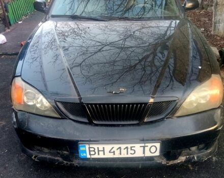 Черный Шевроле Эванда, объемом двигателя 2 л и пробегом 350 тыс. км за 2500 $, фото 1 на Automoto.ua