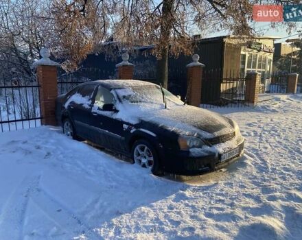 Чорний Шевроле Еванда, об'ємом двигуна 2 л та пробігом 340 тис. км за 2600 $, фото 1 на Automoto.ua