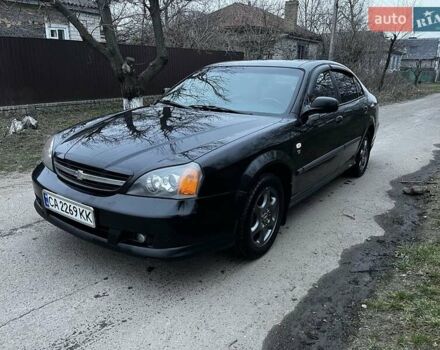 Черный Шевроле Эванда, объемом двигателя 2 л и пробегом 278 тыс. км за 3500 $, фото 1 на Automoto.ua