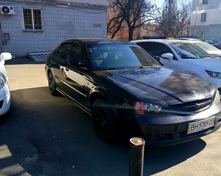 Черный Шевроле Эванда, объемом двигателя 2 л и пробегом 350 тыс. км за 2200 $, фото 1 на Automoto.ua