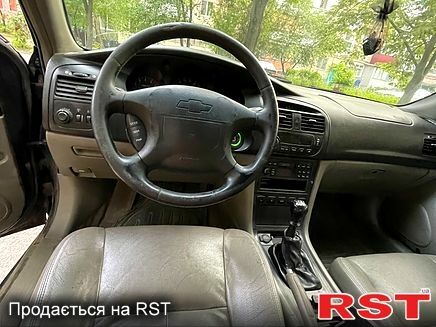 Шевроле Еванда 2005 у Харкові на Automoto.ua Чорний Шевроле Еванда, об'ємом двигуна 2 л та пробігом 258 тис. км за 3100 $, фото 1 на Automoto.ua
