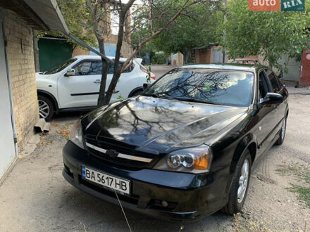 Черный Шевроле Эванда, объемом двигателя 2.5 л и пробегом 187 тыс. км за 4700 $, фото 1 на Automoto.ua