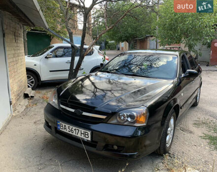 Черный Шевроле Эванда, объемом двигателя 2.5 л и пробегом 187 тыс. км за 4700 $, фото 1 на Automoto.ua