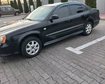 Чорний Шевроле Еванда, об'ємом двигуна 2 л та пробігом 270 тис. км за 2700 $, фото 1 на Automoto.ua