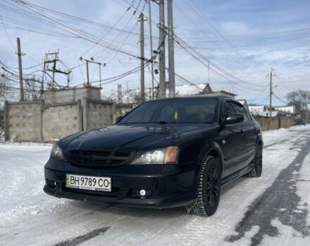 Чорний Шевроле Еванда, об'ємом двигуна 2 л та пробігом 450 тис. км за 3300 $, фото 1 на Automoto.ua