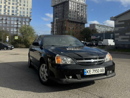 Черный Шевроле Эванда, объемом двигателя 2 л и пробегом 320 тыс. км за 3200 $, фото 1 на Automoto.ua