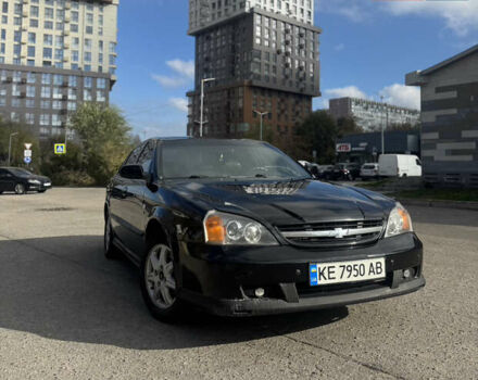 Черный Шевроле Эванда, объемом двигателя 2 л и пробегом 320 тыс. км за 3200 $, фото 1 на Automoto.ua