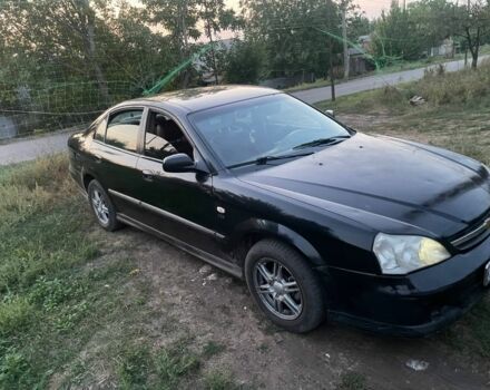 Чорний Шевроле Еванда, об'ємом двигуна 2 л та пробігом 225 тис. км за 2607 $, фото 1 на Automoto.ua