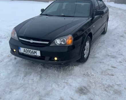 Черный Шевроле Эванда, объемом двигателя 2 л и пробегом 92 тыс. км за 6000 $, фото 1 на Automoto.ua