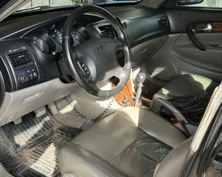 Чорний Шевроле Еванда, об'ємом двигуна 2 л та пробігом 240 тис. км за 2900 $, фото 1 на Automoto.ua