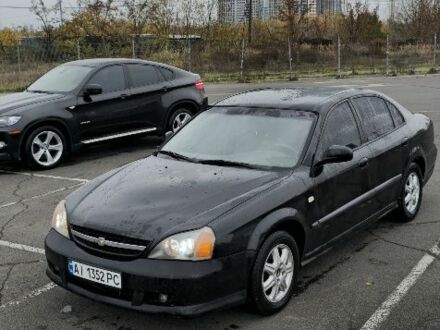 Черный Шевроле Эванда, объемом двигателя 2 л и пробегом 350 тыс. км за 3400 $, фото 1 на Automoto.ua