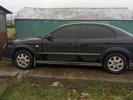 Черный Шевроле Эванда, объемом двигателя 2 л и пробегом 320 тыс. км за 4200 $, фото 1 на Automoto.ua