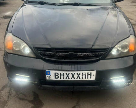 Чорний Шевроле Еванда, об'ємом двигуна 2 л та пробігом 266 тис. км за 3000 $, фото 1 на Automoto.ua