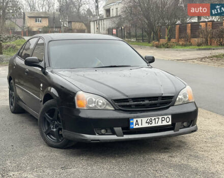Чорний Шевроле Еванда, об'ємом двигуна 2 л та пробігом 292 тис. км за 3000 $, фото 1 на Automoto.ua