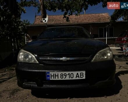 Чорний Шевроле Еванда, об'ємом двигуна 2 л та пробігом 150 тис. км за 3800 $, фото 1 на Automoto.ua