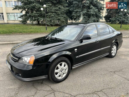 Черный Шевроле Эванда, объемом двигателя 2 л и пробегом 193 тыс. км за 4200 $, фото 1 на Automoto.ua