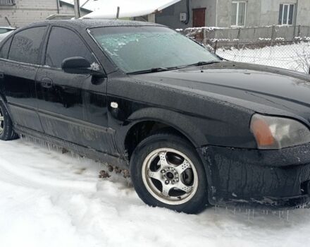 Черный Шевроле Эванда, объемом двигателя 2 л и пробегом 380 тыс. км за 1620 $, фото 1 на Automoto.ua