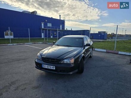Черный Шевроле Эванда, объемом двигателя 2 л и пробегом 290 тыс. км за 2850 $, фото 1 на Automoto.ua