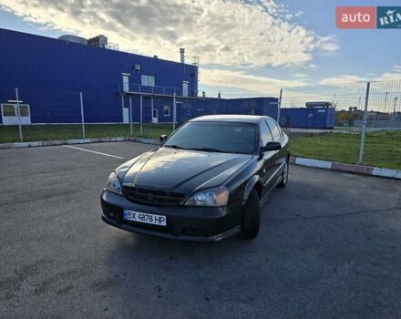 Чорний Шевроле Еванда, об'ємом двигуна 2 л та пробігом 290 тис. км за 2850 $, фото 1 на Automoto.ua