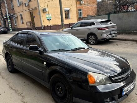 Черный Шевроле Эванда, объемом двигателя 2 л и пробегом 280 тыс. км за 3200 $, фото 1 на Automoto.ua