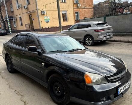 Черный Шевроле Эванда, объемом двигателя 2 л и пробегом 280 тыс. км за 3200 $, фото 1 на Automoto.ua