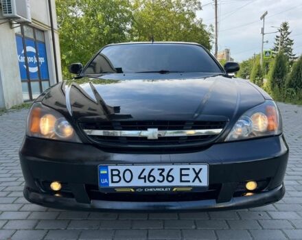 Черный Шевроле Эванда, объемом двигателя 2.5 л и пробегом 150 тыс. км за 3000 $, фото 1 на Automoto.ua