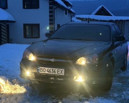 Черный Шевроле Эванда, объемом двигателя 2.5 л и пробегом 190 тыс. км за 3600 $, фото 1 на Automoto.ua