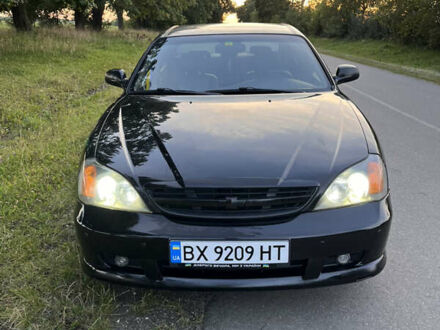 Чорний Шевроле Еванда, об'ємом двигуна 2 л та пробігом 260 тис. км за 4000 $, фото 1 на Automoto.ua