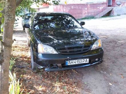 Чорний Шевроле Еванда, об'ємом двигуна 2.5 л та пробігом 270 тис. км за 2910 $, фото 1 на Automoto.ua