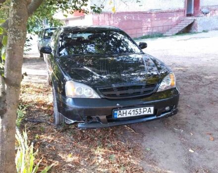 Черный Шевроле Эванда, объемом двигателя 2.5 л и пробегом 270 тыс. км за 2910 $, фото 1 на Automoto.ua