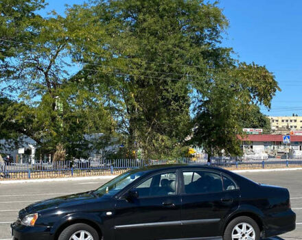 Черный Шевроле Эванда, объемом двигателя 2 л и пробегом 266 тыс. км за 3600 $, фото 1 на Automoto.ua