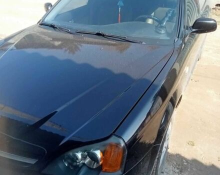 Черный Шевроле Эванда, объемом двигателя 2 л и пробегом 170 тыс. км за 4000 $, фото 1 на Automoto.ua