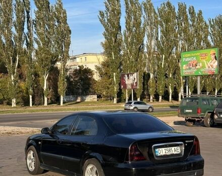 Чорний Шевроле Еванда, об'ємом двигуна 2.5 л та пробігом 210 тис. км за 3000 $, фото 1 на Automoto.ua