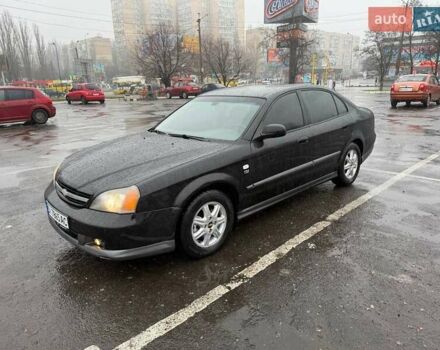 Черный Шевроле Эванда, объемом двигателя 2.49 л и пробегом 256 тыс. км за 3800 $, фото 1 на Automoto.ua