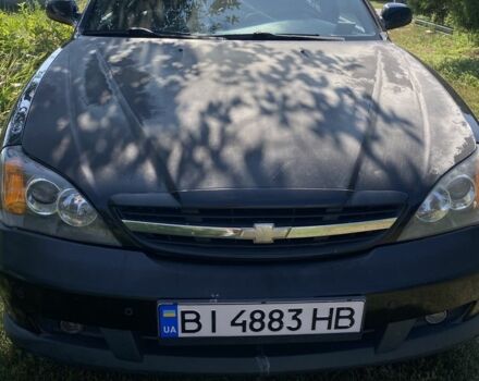 Чорний Шевроле Еванда, об'ємом двигуна 2 л та пробігом 257 тис. км за 2708 $, фото 1 на Automoto.ua