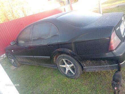 Черный Шевроле Эванда, объемом двигателя 2 л и пробегом 180 тыс. км за 5999 $, фото 1 на Automoto.ua