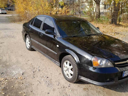 Черный Шевроле Эванда, объемом двигателя 2 л и пробегом 260 тыс. км за 4150 $, фото 1 на Automoto.ua