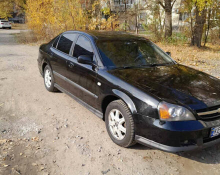 Черный Шевроле Эванда, объемом двигателя 2 л и пробегом 260 тыс. км за 4150 $, фото 1 на Automoto.ua