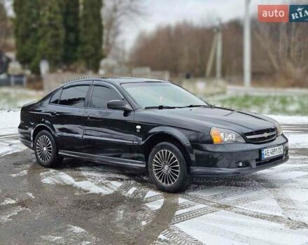 Черный Шевроле Эванда, объемом двигателя 2 л и пробегом 250 тыс. км за 3500 $, фото 1 на Automoto.ua