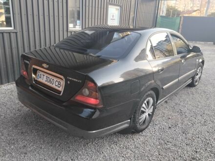 Черный Шевроле Эванда, объемом двигателя 2 л и пробегом 36 тыс. км за 3600 $, фото 1 на Automoto.ua