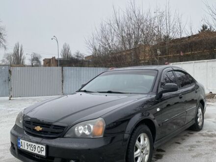 Черный Шевроле Эванда, объемом двигателя 2 л и пробегом 250 тыс. км за 2750 $, фото 1 на Automoto.ua