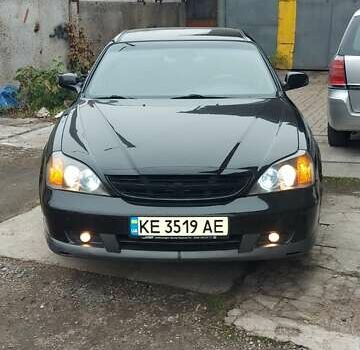 Черный Шевроле Эванда, объемом двигателя 2 л и пробегом 220 тыс. км за 4000 $, фото 1 на Automoto.ua