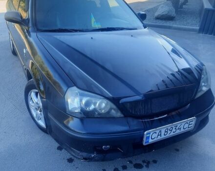 Чорний Шевроле Еванда, об'ємом двигуна 2 л та пробігом 262 тис. км за 3600 $, фото 1 на Automoto.ua