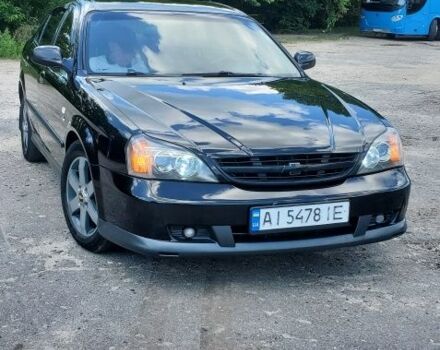 Чорний Шевроле Еванда, об'ємом двигуна 2 л та пробігом 300 тис. км за 3800 $, фото 1 на Automoto.ua